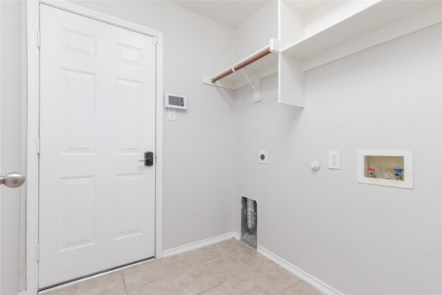 washroom featuring laundry area, baseboards, gas dryer hookup, hookup for a washing machine, and hookup for an electric dryer