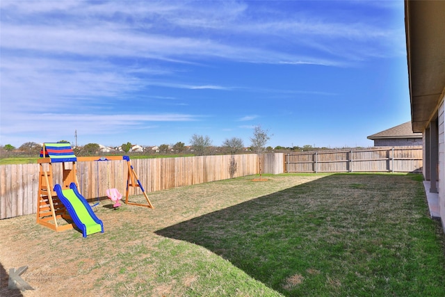 view of yard with a playground