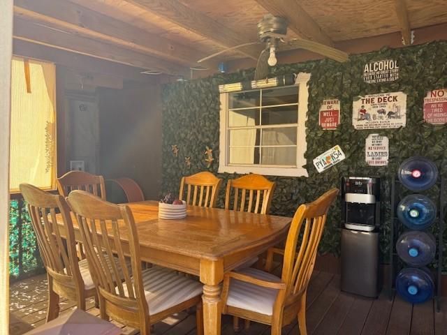 dining area featuring hardwood / wood-style floors and ceiling fan