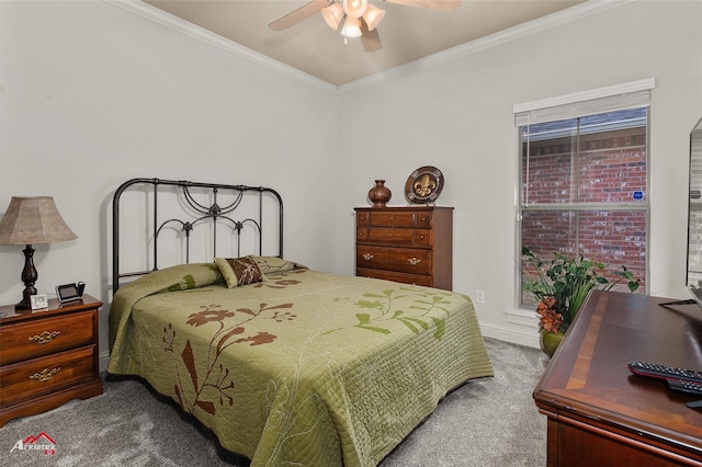 bedroom featuring crown molding, ceiling fan, and carpet flooring