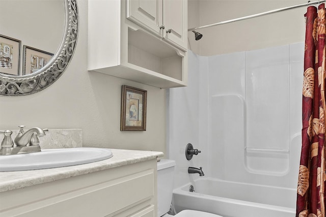 full bathroom featuring shower / bathtub combination with curtain, vanity, and toilet