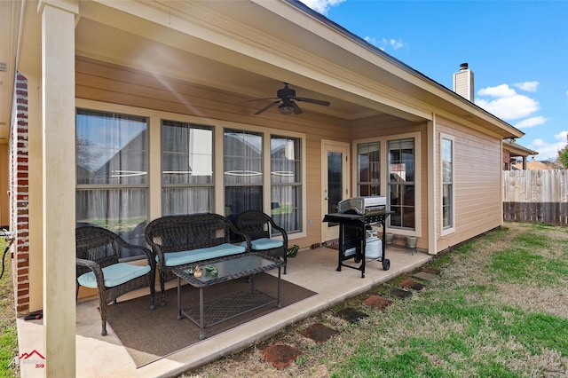 view of patio featuring area for grilling, an outdoor hangout area, and ceiling fan