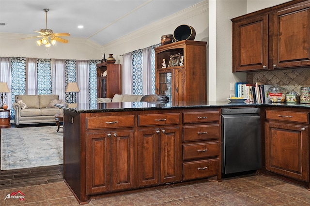 kitchen with lofted ceiling, decorative backsplash, ceiling fan, kitchen peninsula, and crown molding