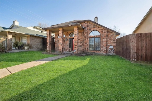 view of front facade with a front lawn