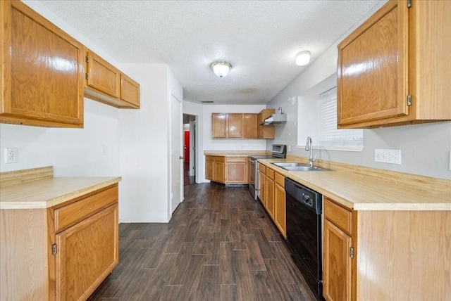 kitchen featuring dishwasher, sink, dark wood-type flooring, a textured ceiling, and stainless steel electric range