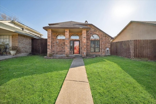 view of front of home with a front yard