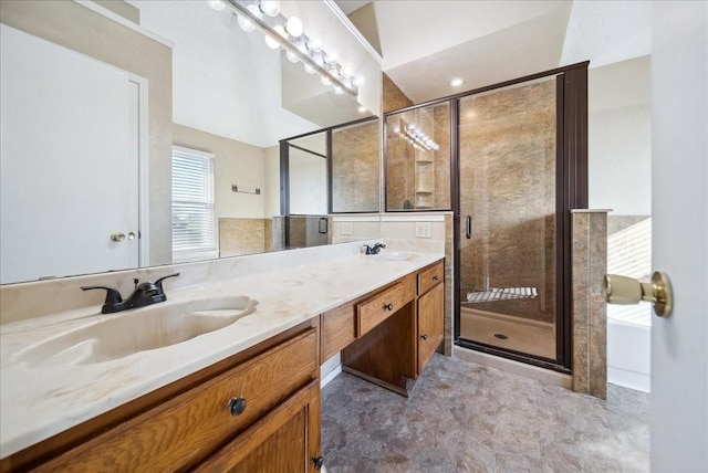 bathroom featuring vanity and shower with separate bathtub