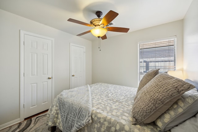 bedroom featuring ceiling fan