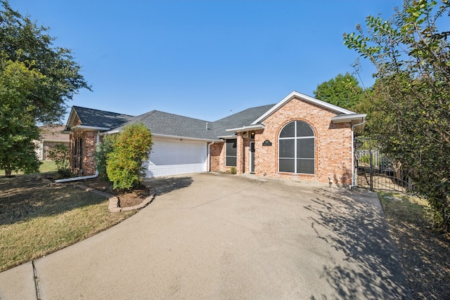 ranch-style home featuring a garage