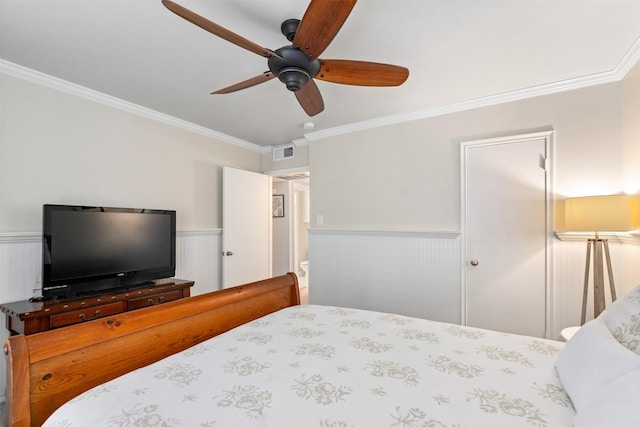 bedroom featuring crown molding and ceiling fan