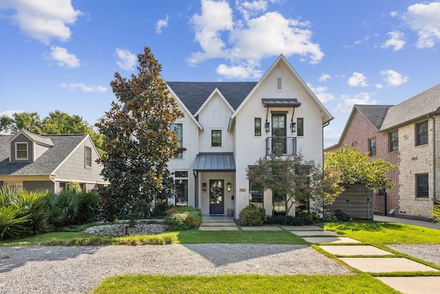 view of front of property with a front lawn