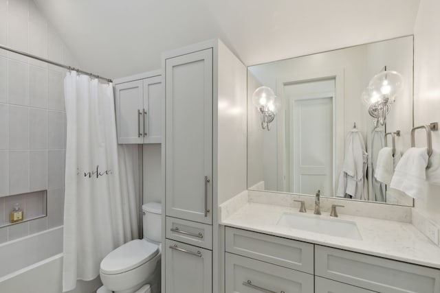 full bathroom with shower / bathtub combination with curtain, vanity, vaulted ceiling, and toilet