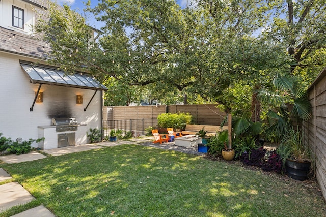 view of yard featuring an outdoor fire pit