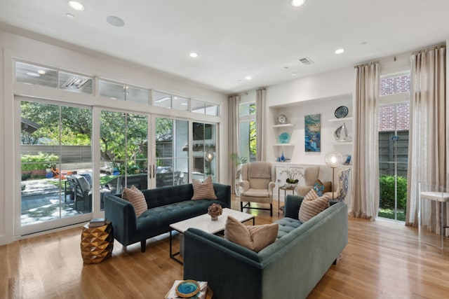 living room with light hardwood / wood-style floors