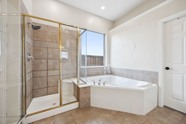 bathroom featuring separate shower and tub and tile patterned flooring