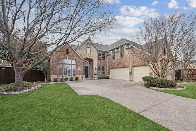 view of front property with a garage and a front lawn