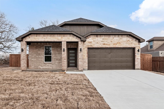 view of front of property featuring a garage