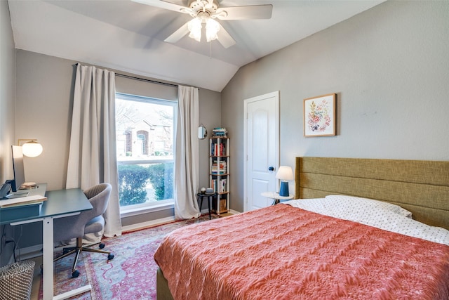 bedroom with lofted ceiling and ceiling fan