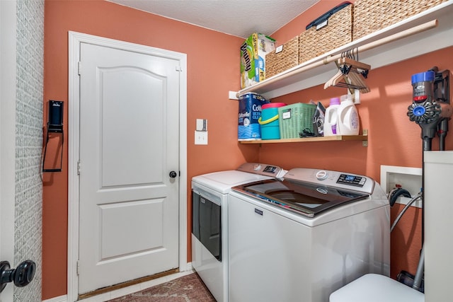 laundry area with washer and dryer