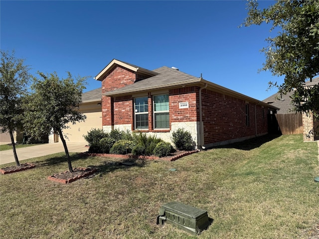 view of home's exterior featuring a garage and a yard