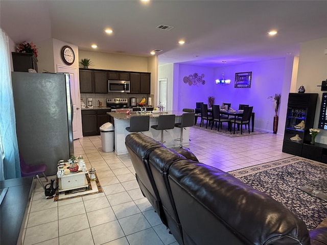 living room with light tile patterned floors