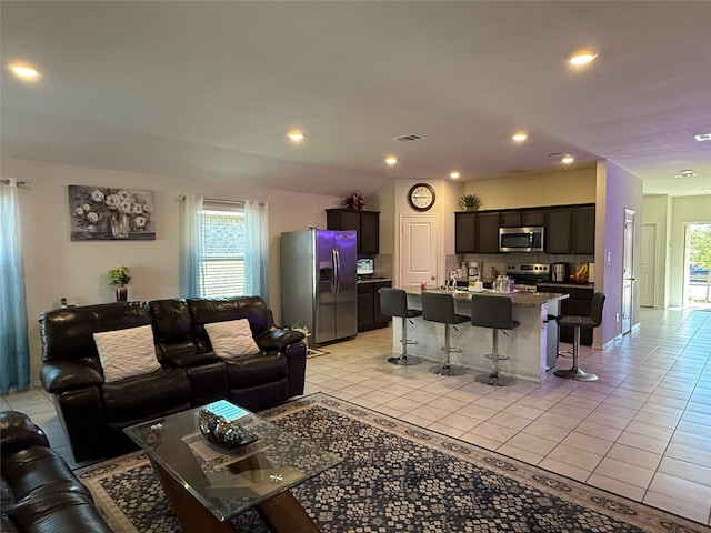 living room with light tile patterned floors