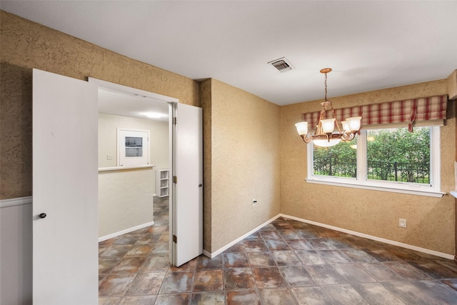 interior space with a notable chandelier