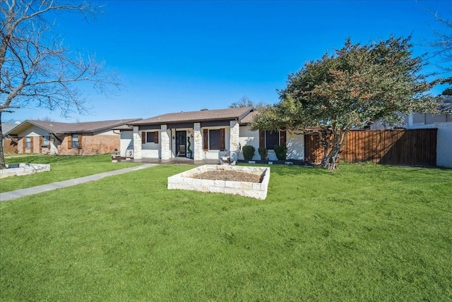 rear view of house with a yard