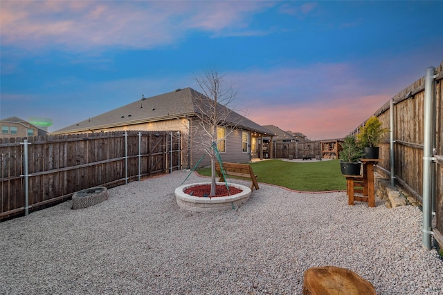 view of yard with a patio area and a fenced backyard