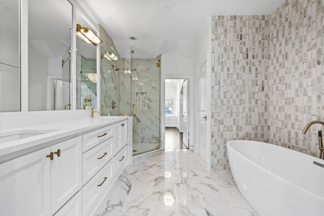 bathroom with independent shower and bath, vanity, and tile walls