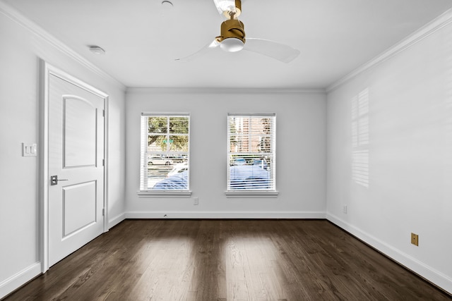 empty room featuring crown molding, ceiling fan, and dark hardwood / wood-style flooring