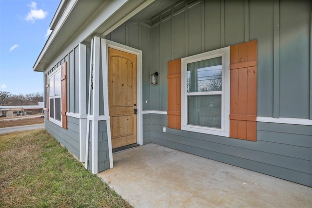 doorway to property featuring a patio area