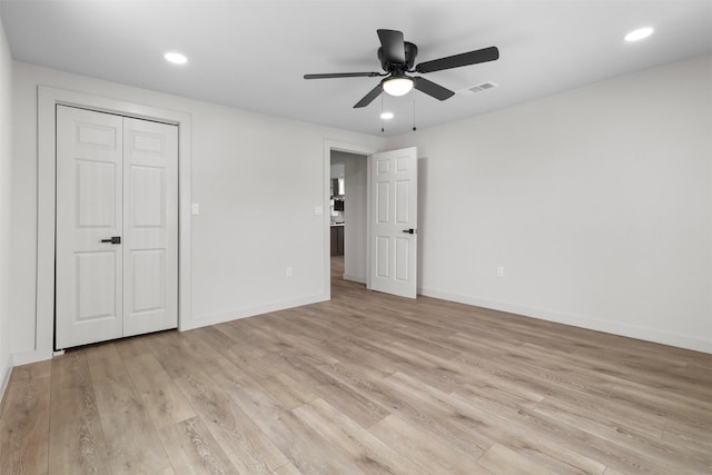 unfurnished bedroom featuring recessed lighting, visible vents, baseboards, and light wood finished floors