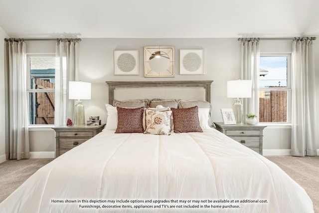 bedroom featuring light colored carpet