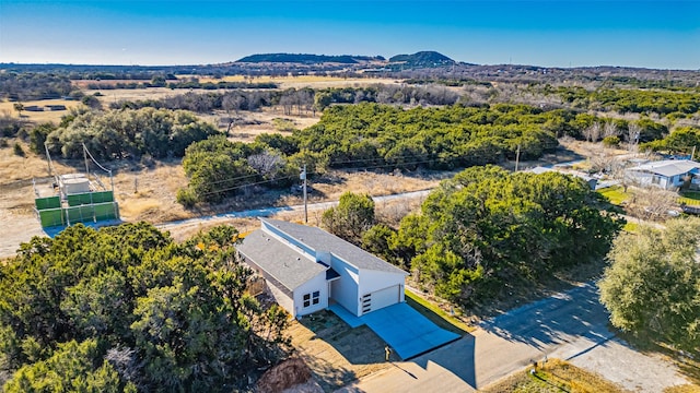 birds eye view of property featuring a mountain view