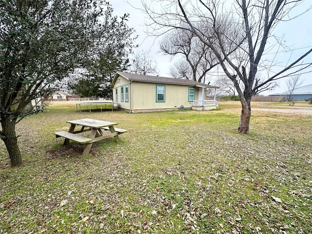 view of yard with a trampoline