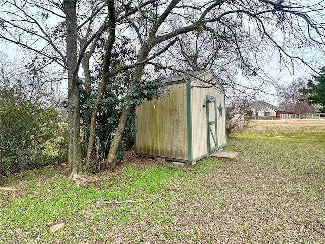 view of outdoor structure featuring a yard