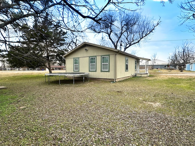 view of home's exterior with a yard