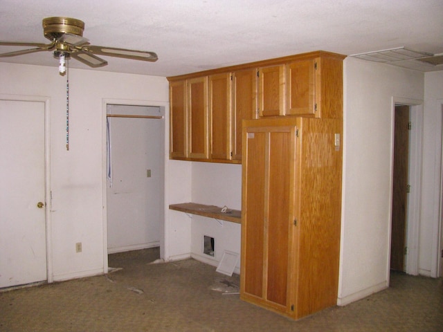 interior space featuring ceiling fan