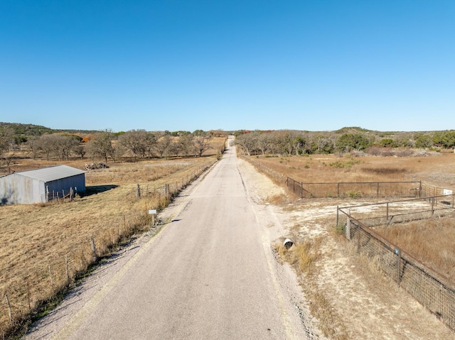 view of road with a rural view