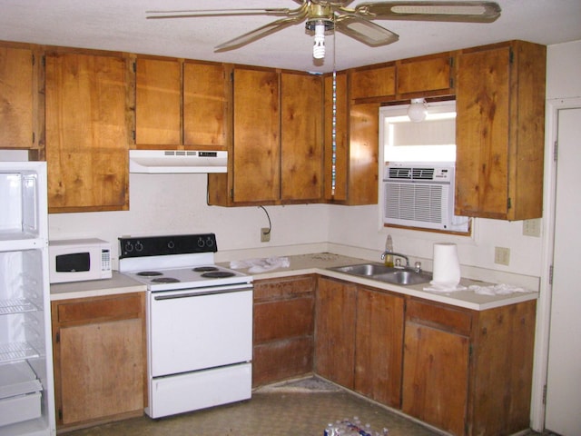 kitchen with ceiling fan, white appliances, and sink