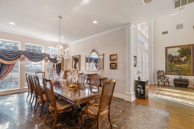 dining space with ornamental molding, dark hardwood / wood-style floors, and a chandelier