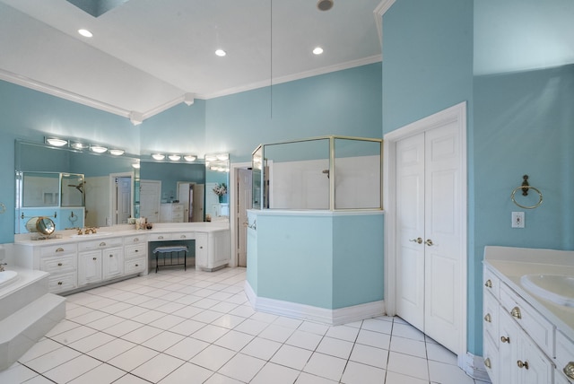 bathroom with crown molding, vanity, separate shower and tub, and tile patterned flooring