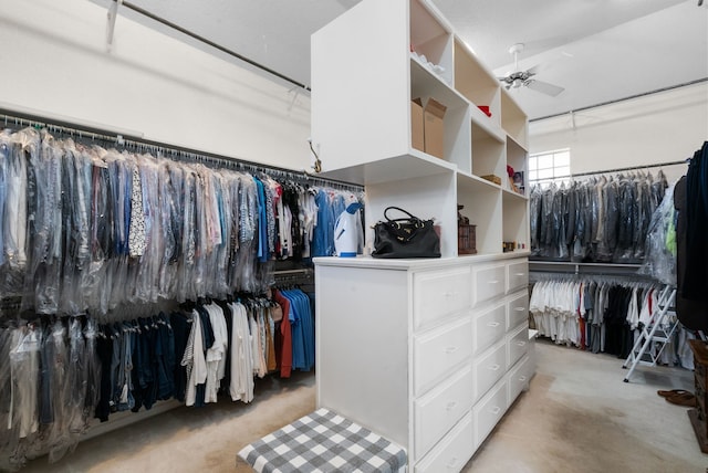 walk in closet featuring ceiling fan