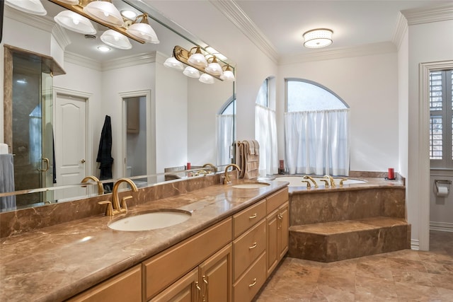 bathroom with ornamental molding, independent shower and bath, and vanity