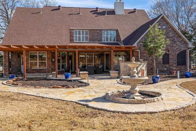 back of house featuring a patio area