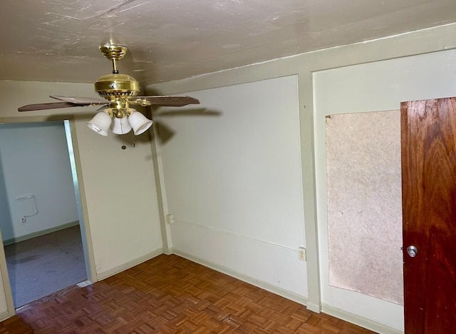 unfurnished room featuring parquet flooring