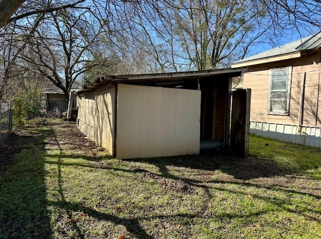 view of home's exterior with a yard