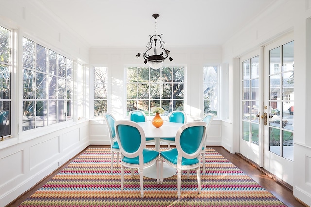 sunroom featuring a healthy amount of sunlight