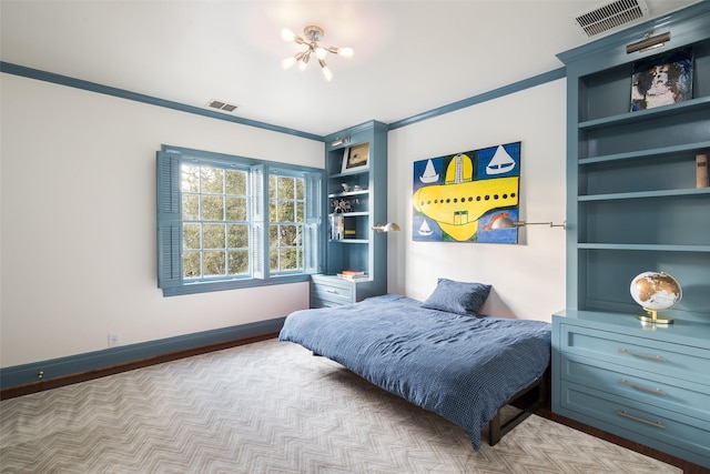 bedroom featuring ornamental molding and an inviting chandelier